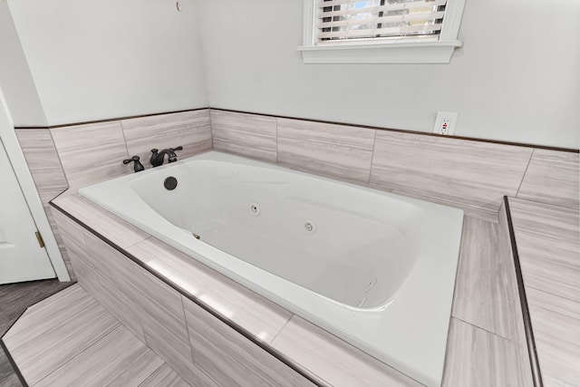 bathroom featuring a jetted tub