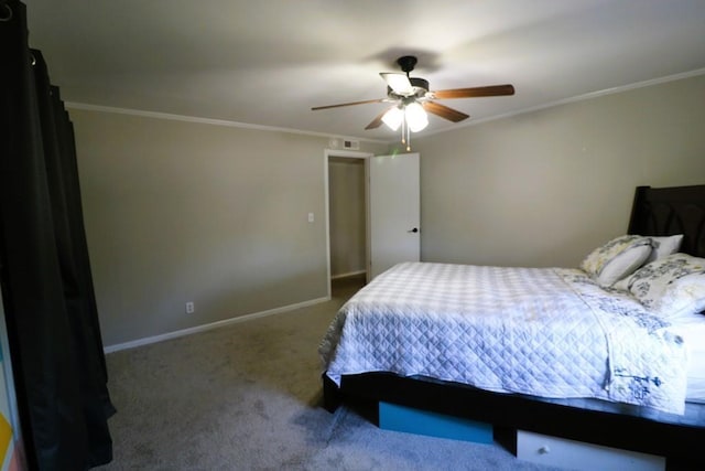 bedroom with ornamental molding, ceiling fan, and carpet flooring