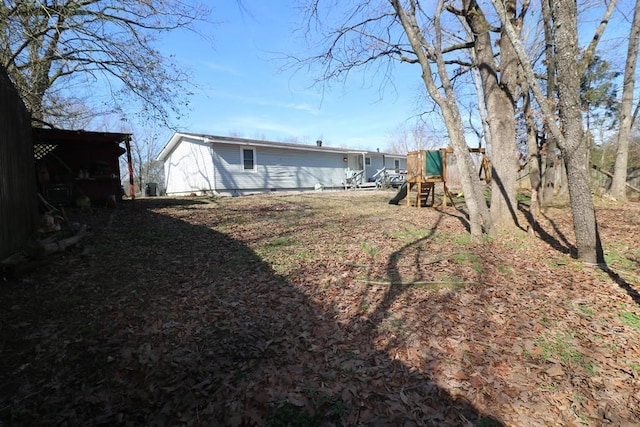 view of yard featuring a playground