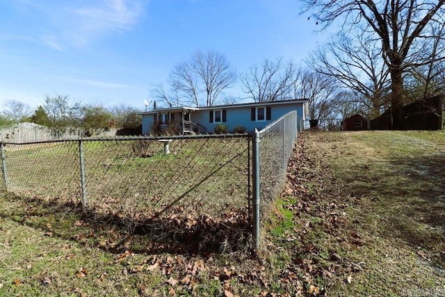 view of front of home with a front lawn