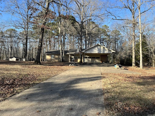 single story home featuring a carport