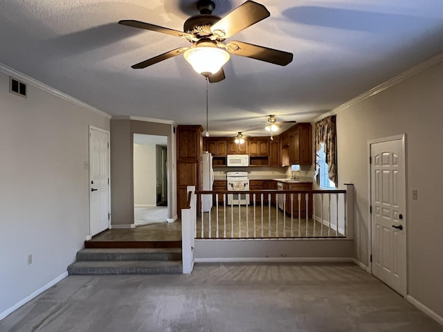 unfurnished living room with crown molding and light colored carpet