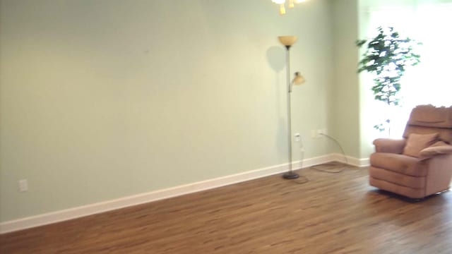 living area featuring dark hardwood / wood-style flooring