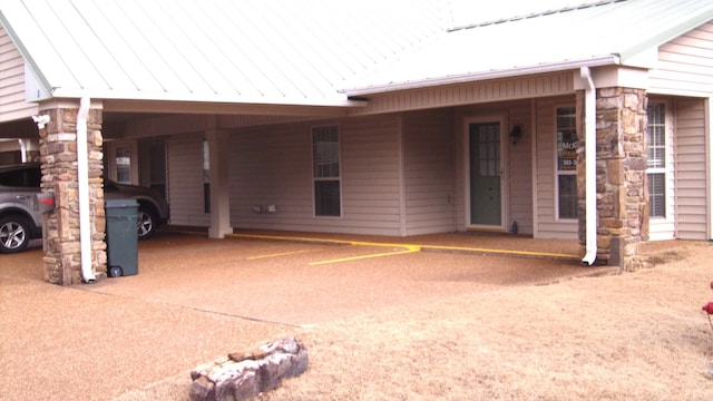 view of front of house featuring a carport