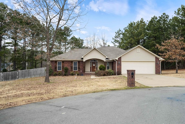 ranch-style house featuring a garage