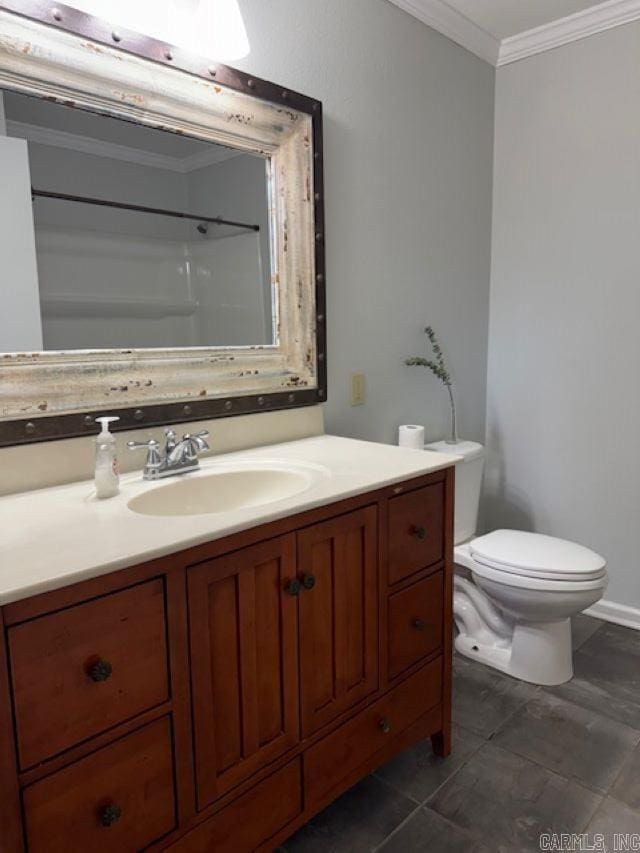 bathroom with vanity, a shower, ornamental molding, and toilet