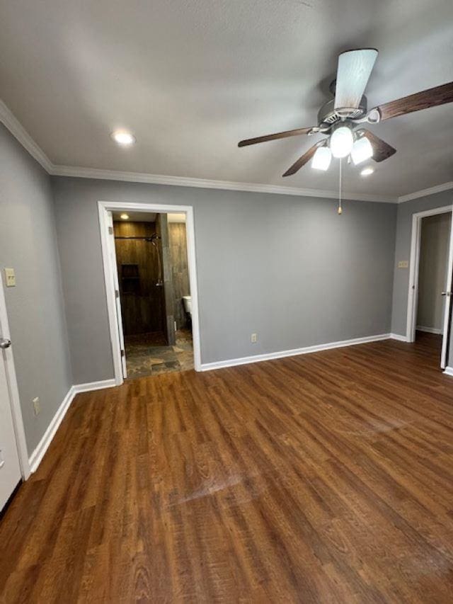 interior space with crown molding, dark hardwood / wood-style floors, and ceiling fan