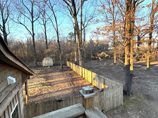 deck with a storage shed