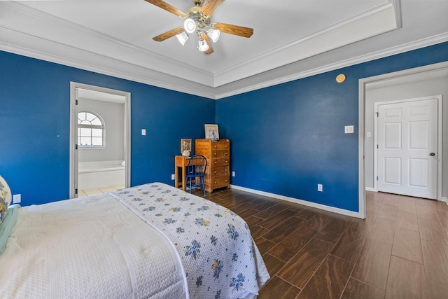 bedroom with dark wood-type flooring, ceiling fan, ornamental molding, and a raised ceiling