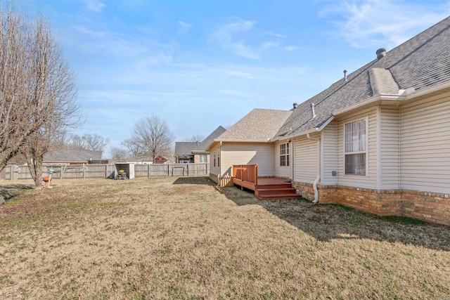 view of yard featuring a wooden deck