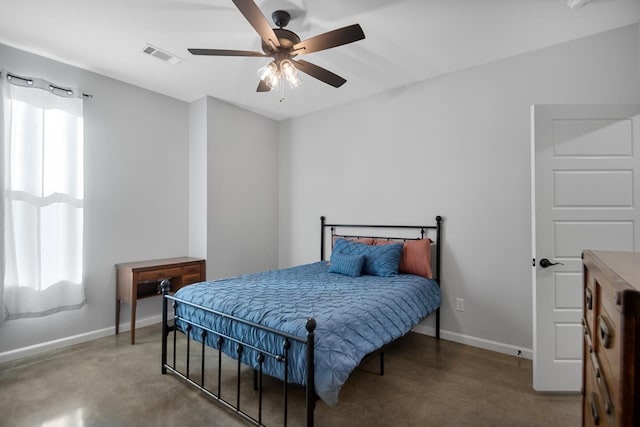 bedroom featuring concrete floors and ceiling fan