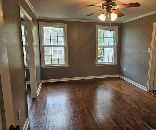 unfurnished room with crown molding, ceiling fan, and dark hardwood / wood-style floors