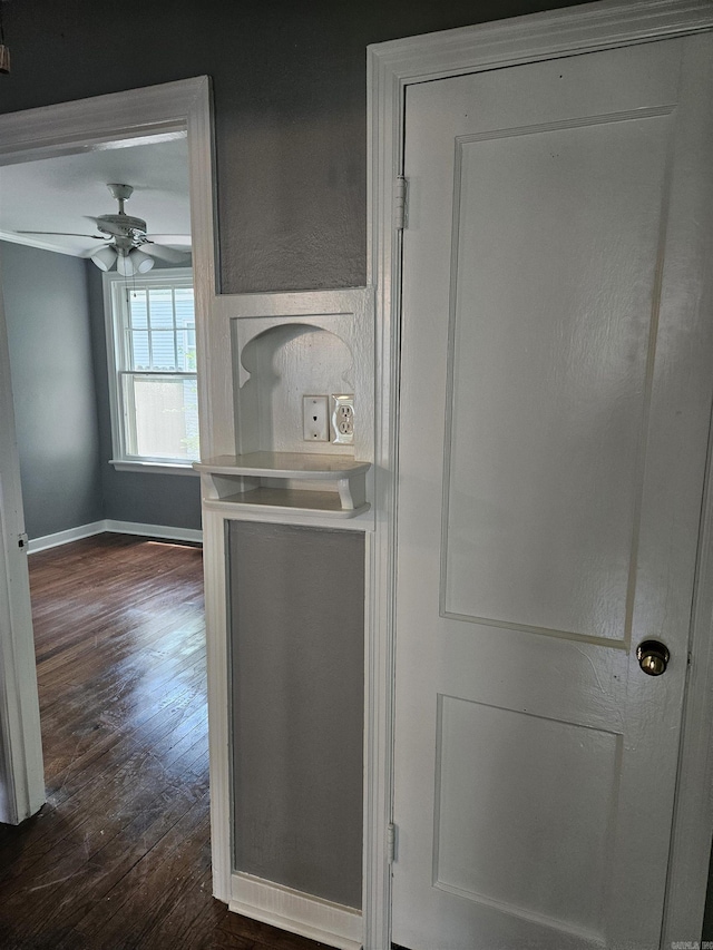 interior details with hardwood / wood-style flooring and ceiling fan