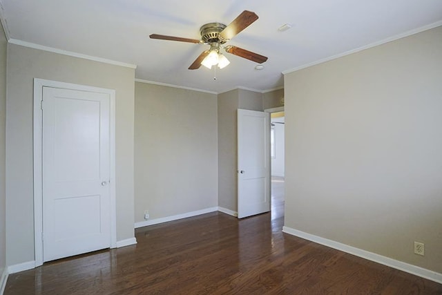 unfurnished bedroom featuring crown molding, dark hardwood / wood-style floors, and ceiling fan