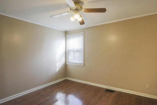 unfurnished room featuring crown molding, ceiling fan, and dark hardwood / wood-style floors