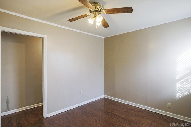 unfurnished room featuring crown molding, dark hardwood / wood-style floors, and ceiling fan