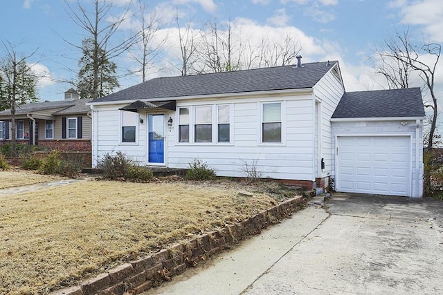 single story home with a garage and a front yard