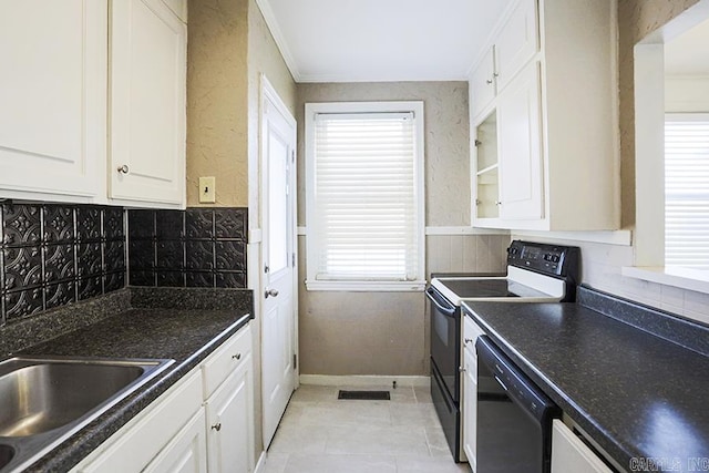 kitchen with sink, white cabinetry, crown molding, black appliances, and backsplash