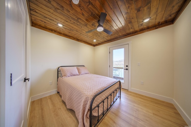 bedroom with access to exterior, wood ceiling, ornamental molding, and light hardwood / wood-style floors