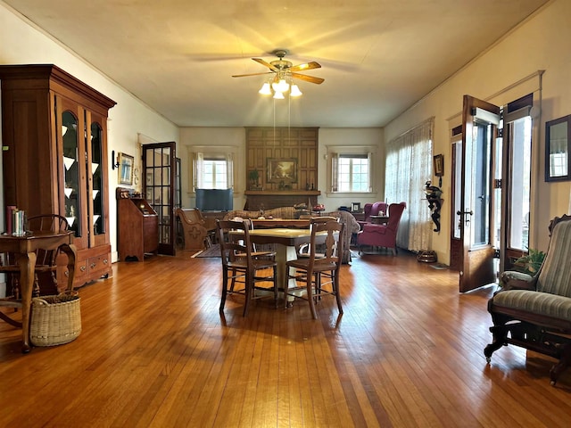 dining area featuring plenty of natural light, hardwood / wood-style floors, and ceiling fan