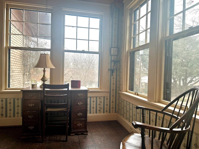 office with plenty of natural light and radiator heating unit