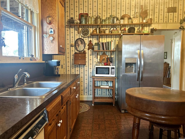 kitchen with white appliances and sink