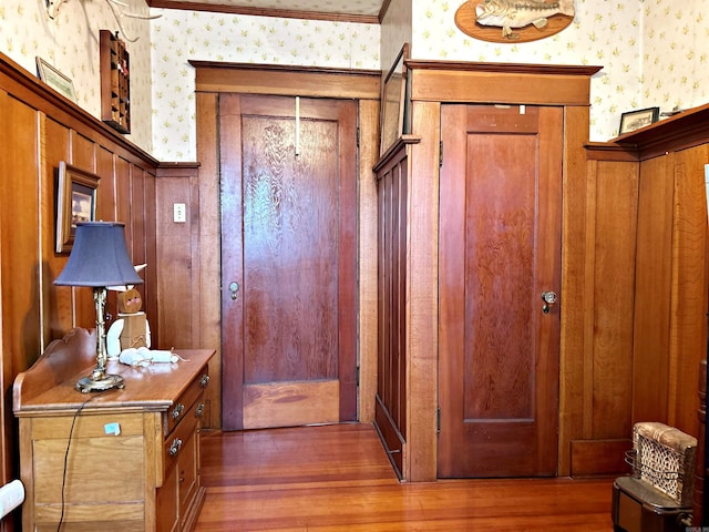 hall with dark hardwood / wood-style floors