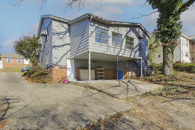 exterior space with a carport