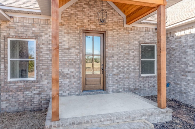 property entrance featuring a patio