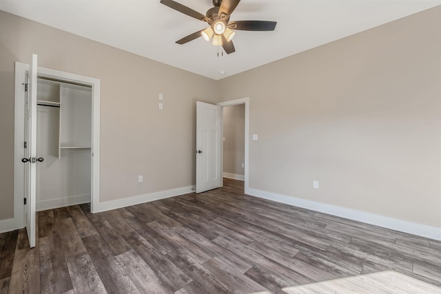 unfurnished bedroom featuring wood-type flooring, ceiling fan, and a closet