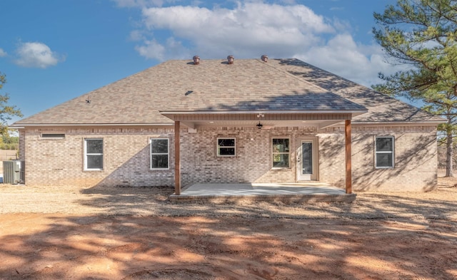 rear view of house featuring a patio and ceiling fan