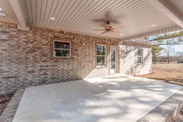 view of patio / terrace featuring ceiling fan