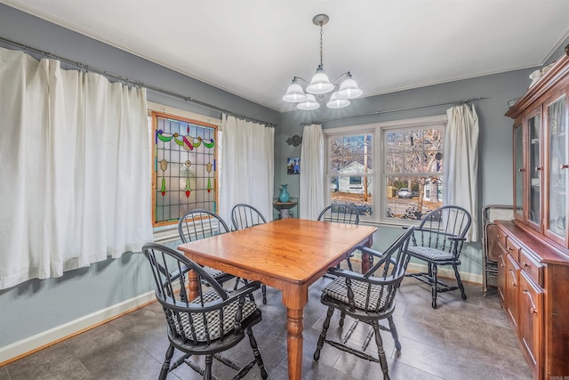 dining room with a chandelier