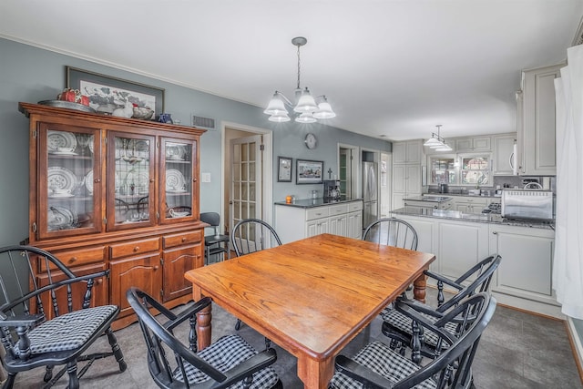 dining room featuring an inviting chandelier