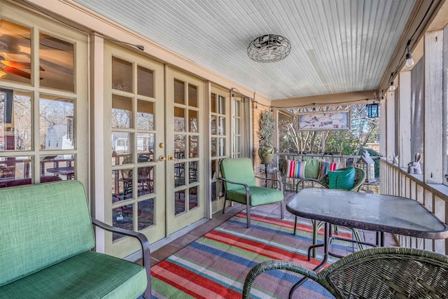 sunroom / solarium with wooden ceiling