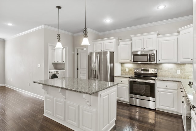 kitchen featuring white cabinetry, appliances with stainless steel finishes, a center island, and pendant lighting