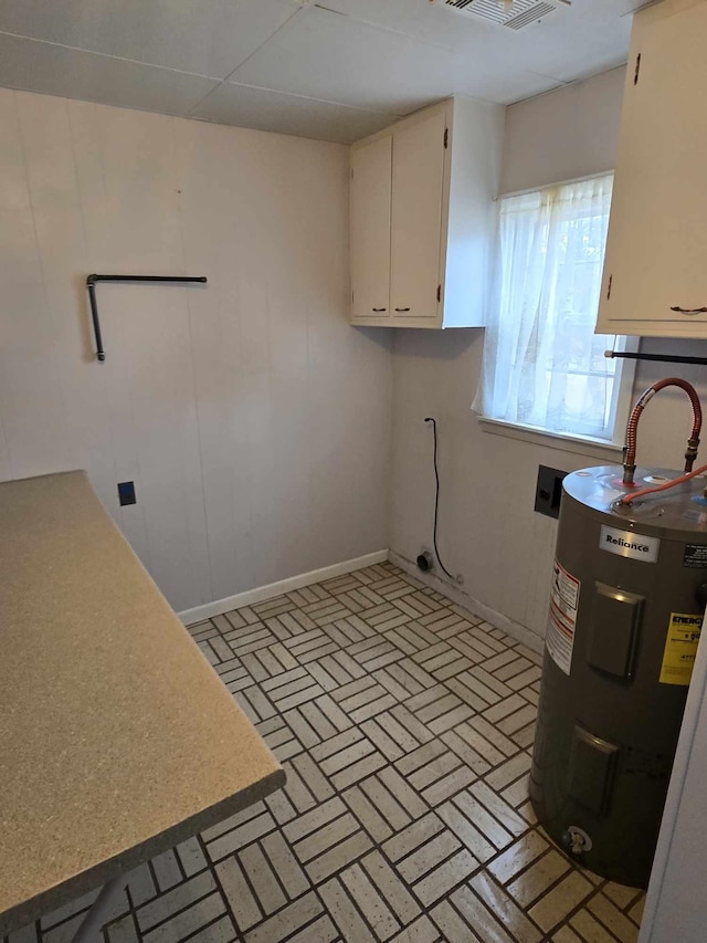 laundry area featuring electric water heater