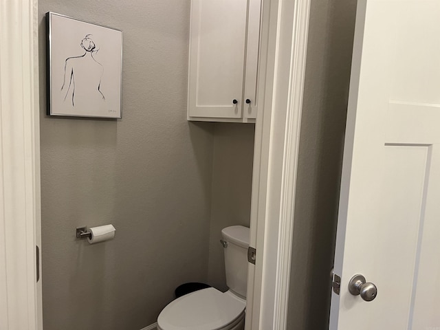 bathroom featuring toilet