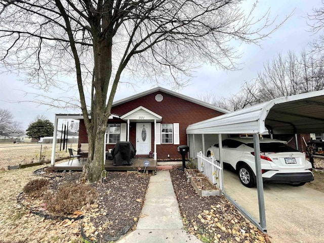 view of front of home featuring a carport