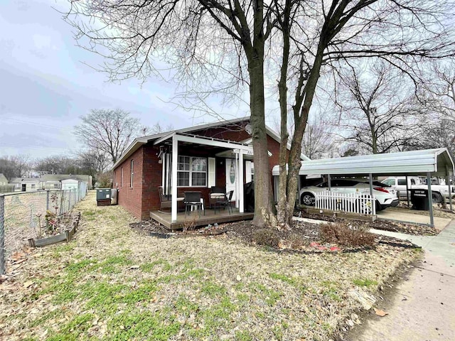 bungalow-style home with a front lawn