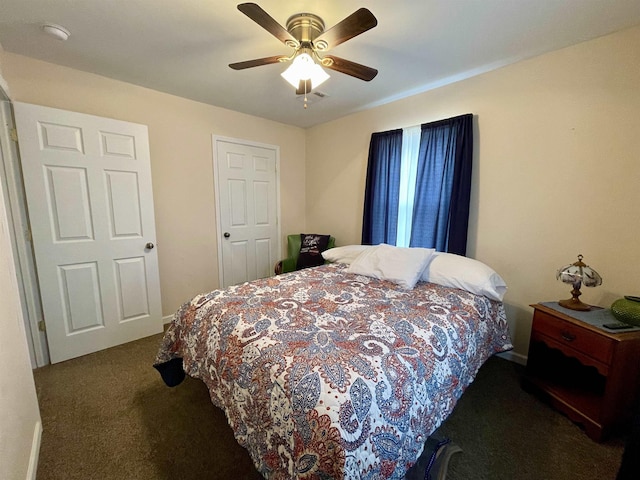 carpeted bedroom with ceiling fan