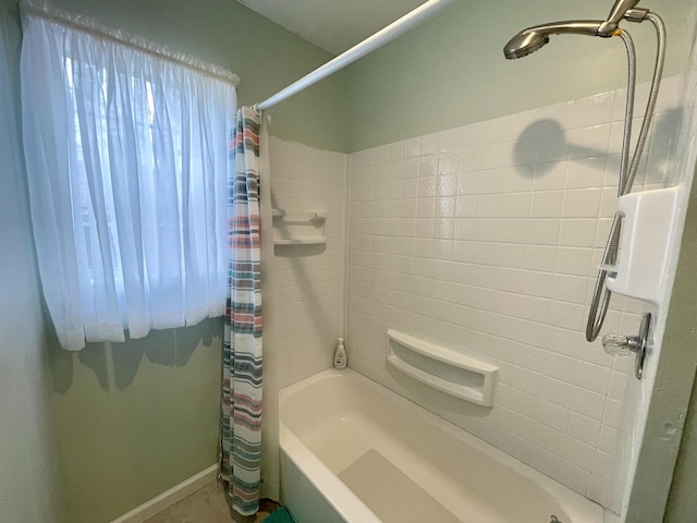 bathroom featuring shower / bath combo with shower curtain