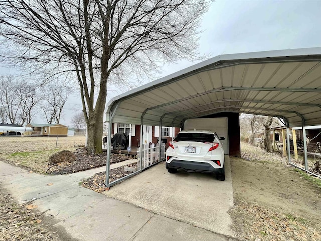 view of parking / parking lot featuring a carport