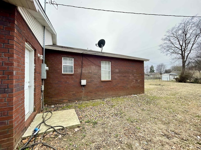 view of home's exterior featuring a lawn