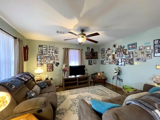 living room featuring ceiling fan