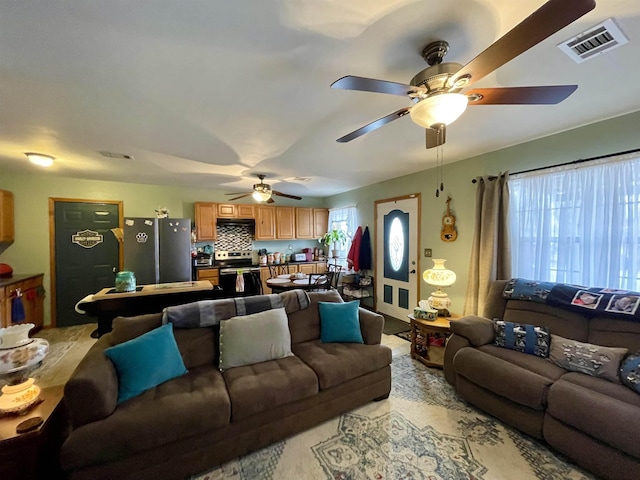 living room with ceiling fan