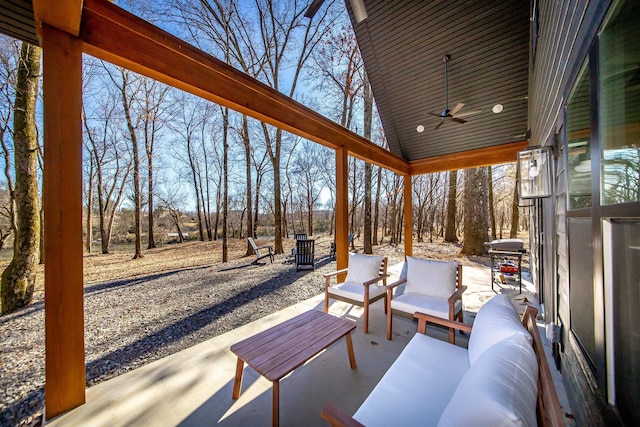 view of patio featuring outdoor lounge area and ceiling fan