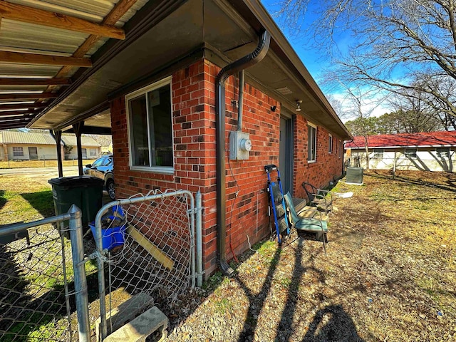 view of home's exterior with central AC unit