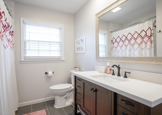 bathroom with tile patterned flooring, vanity, a shower with shower curtain, and toilet