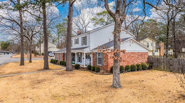 view of front of home with a front lawn and a porch